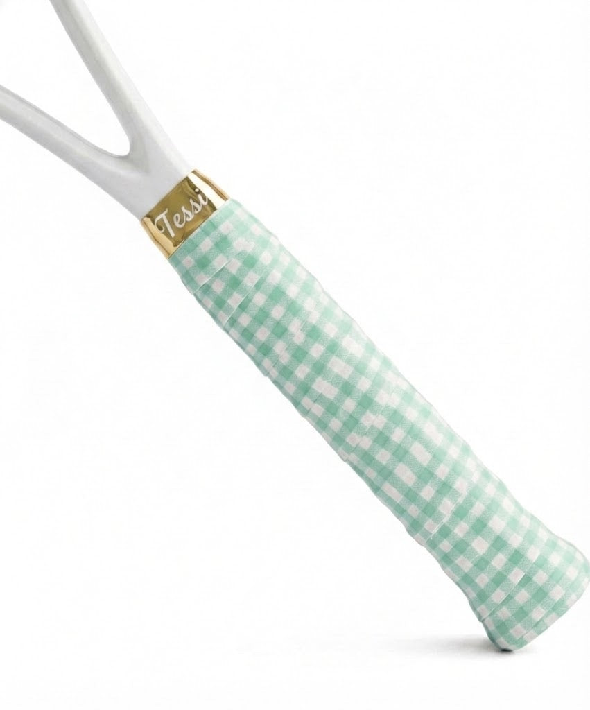 TESSI mint green gingham overgrip wrapped on a white racket